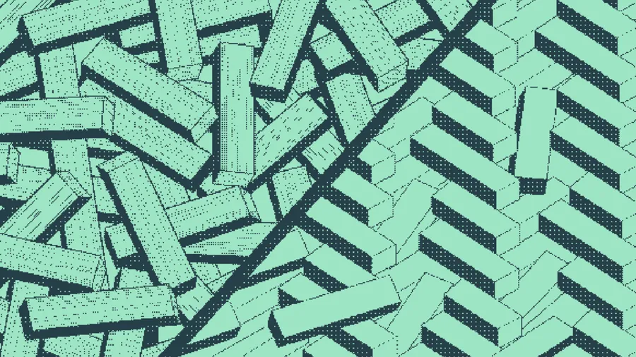Wooden beams piled haphazardly beside beams laid in a herringbone