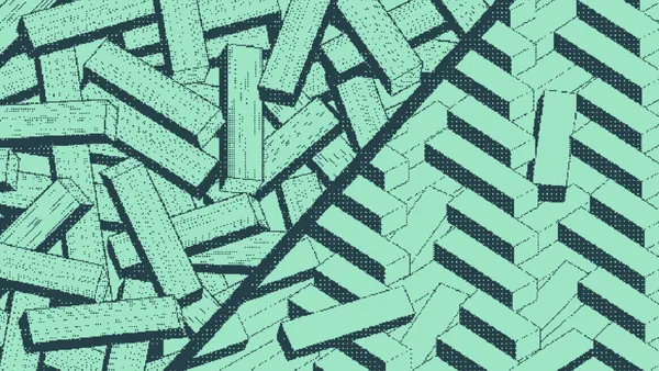 Wooden beams piled haphazardly beside beams laid in a herringbone